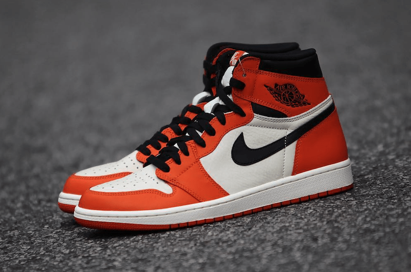 orange and blue spike lee jordans
