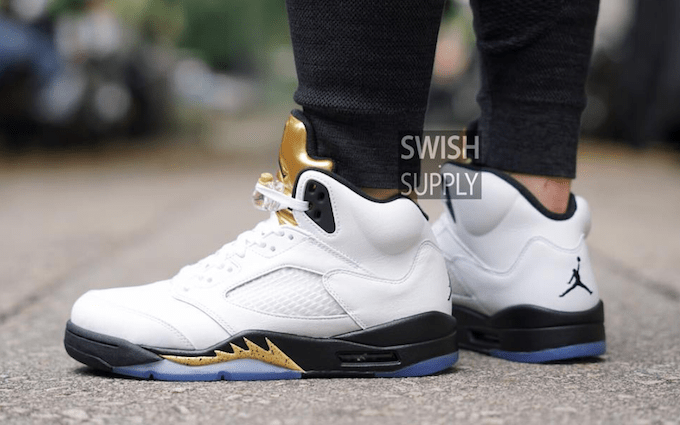 olympic-air-jordan-5-metallic-gold-on-feet-1