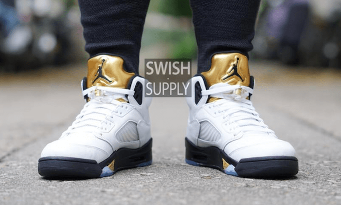 olympic-air-jordan-5-metallic-gold-on-feet-2