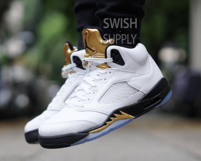 olympic-air-jordan-5-metallic-gold-on-feet-3
