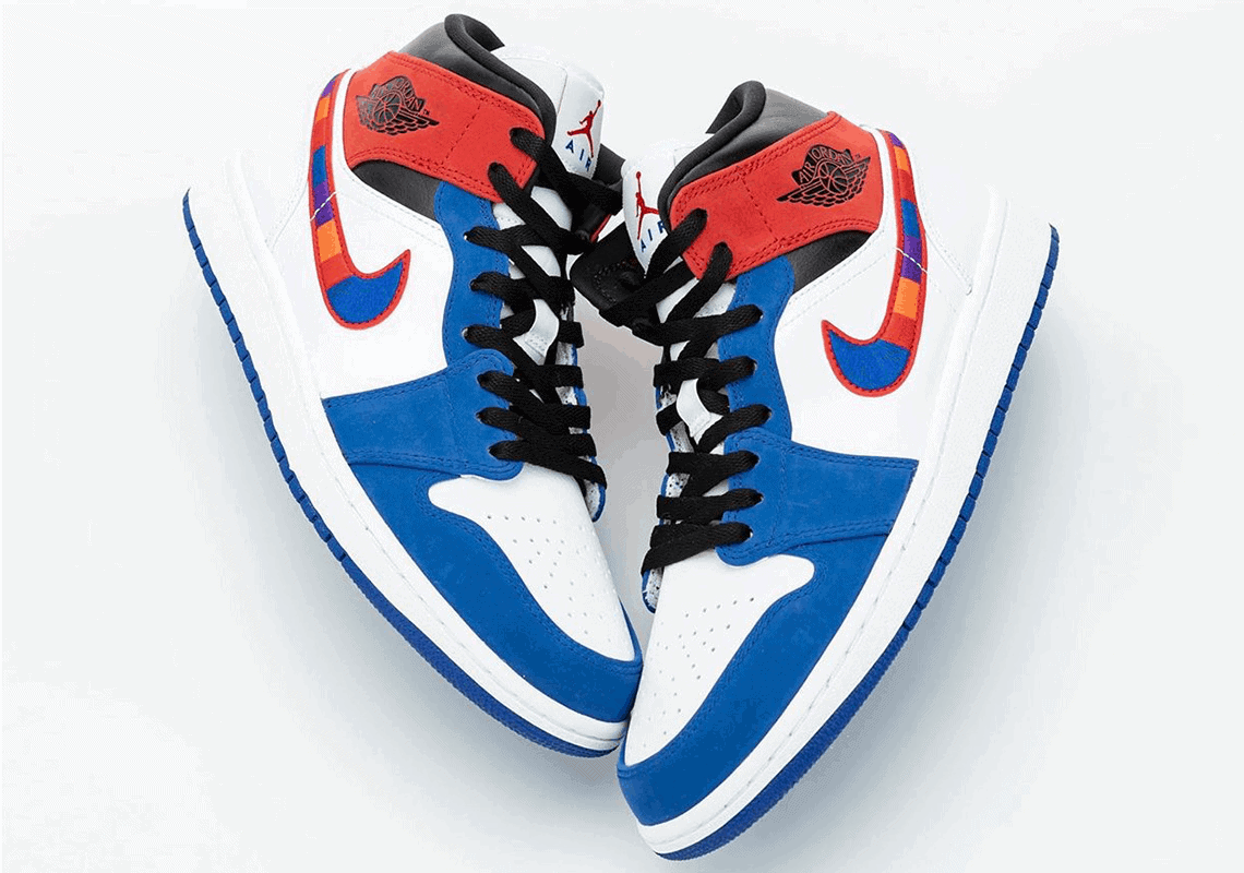 This Air Jordan 1 Mid Appears with A Multicolored Embroidered Nike Swoosh