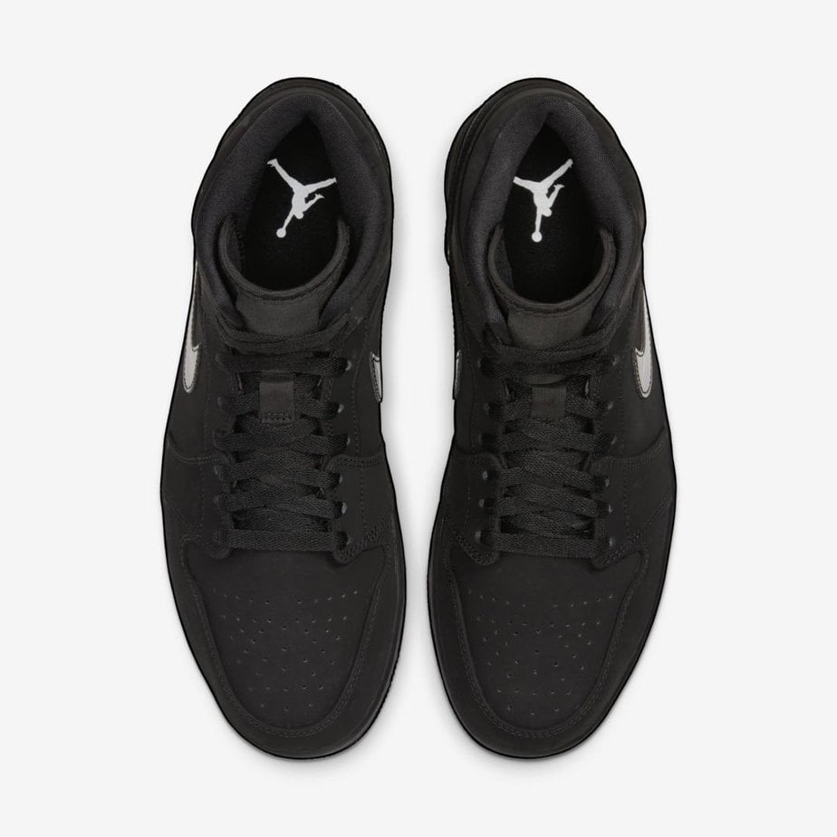 A Triple Black Air Jordan 1 Mid Just Dropped