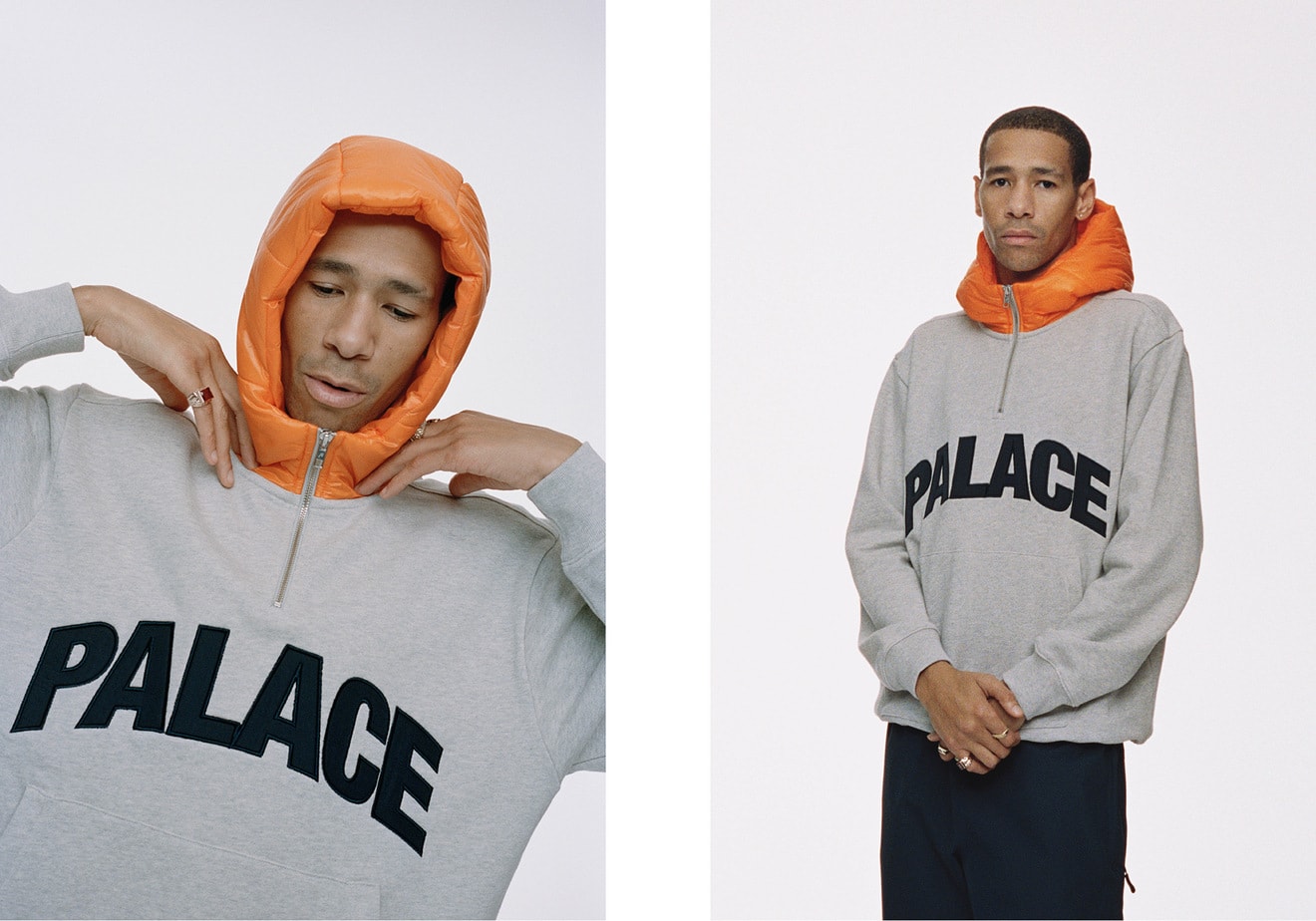 Palace grey sweatshirt layered over an orange hoodie