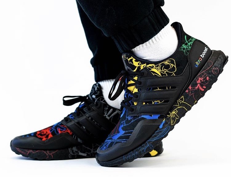 Black Disney x adidas Ultra Boost Goofy sneakers with colorful character graphics