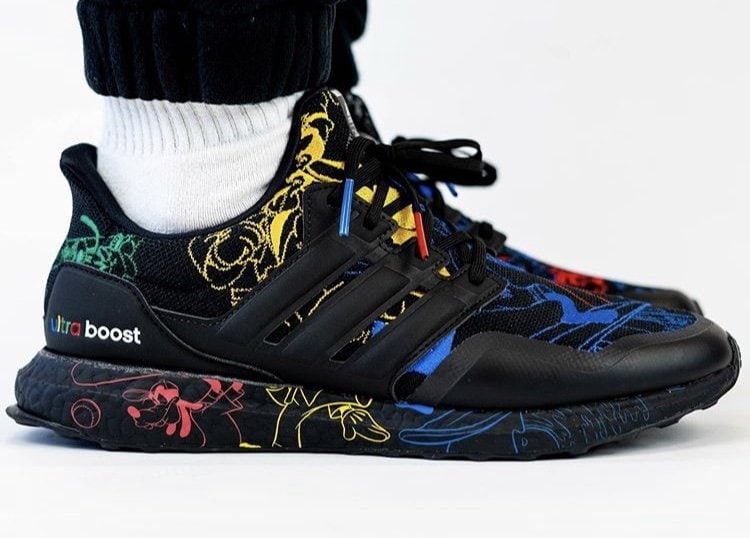 Side view of black Disney x adidas Ultra Boost Goofy sneakers