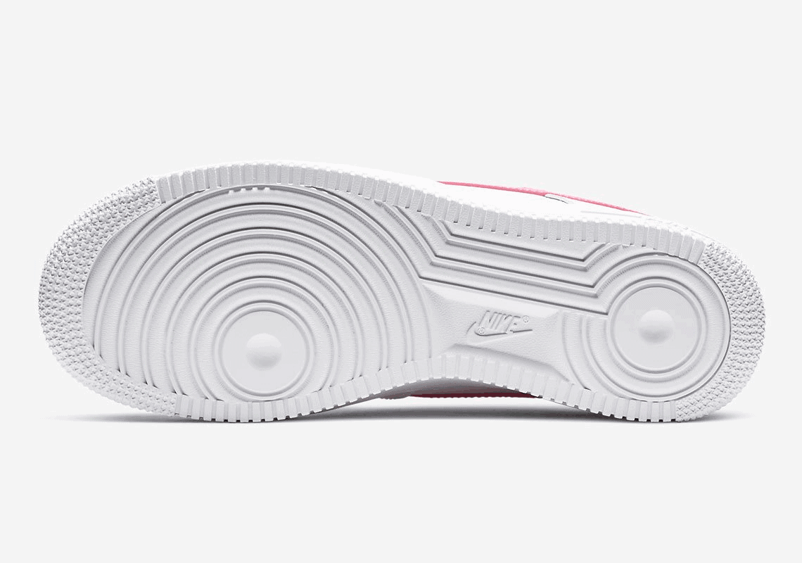 This Nike Air Force 1 Low Features Fire Pink Swooshes