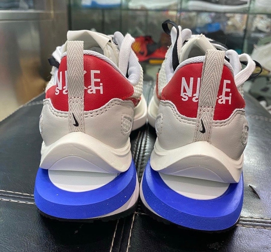 Official Look at the sacai x Nike VaporWaffle "Game Royal/Red"