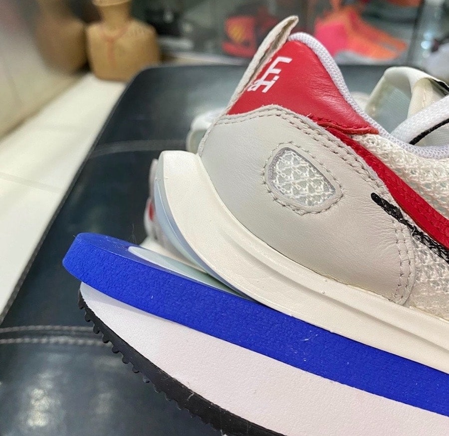 Official Look at the sacai x Nike VaporWaffle "Game Royal/Red"