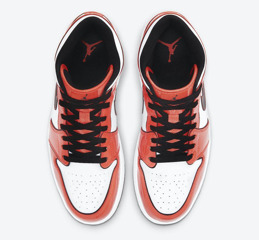 Jordan Brand Paints the Air Jordan 1 Mid in "Turf Orange"