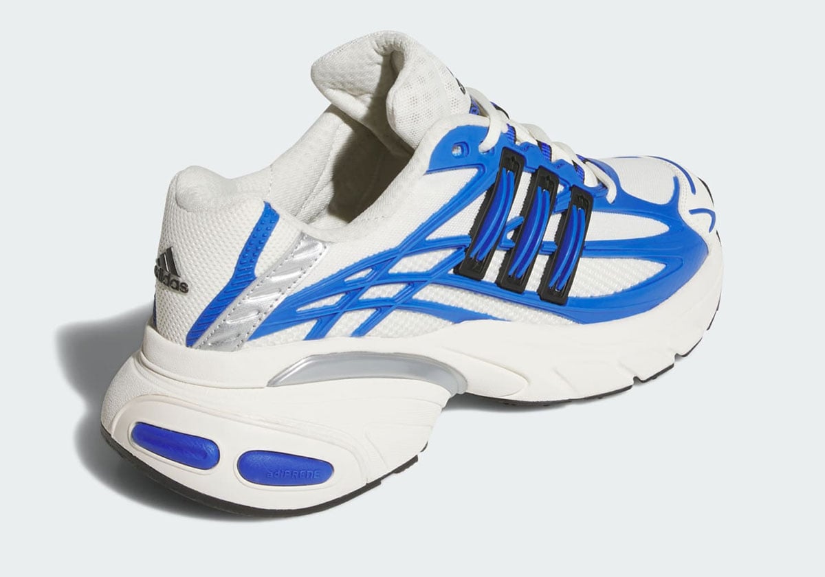 Rear three-quarter view showing the blue adiPRENE heel pod and black 3-Stripes lace cage on the Adistar XLG 2.0
