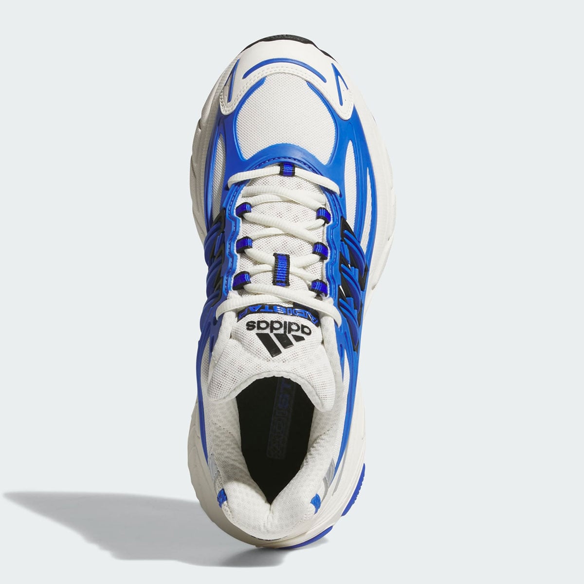 Top-down look at the tongue branding and lace cage on the adidas Adistar XLG 2.0 royal blue lifestyle runner