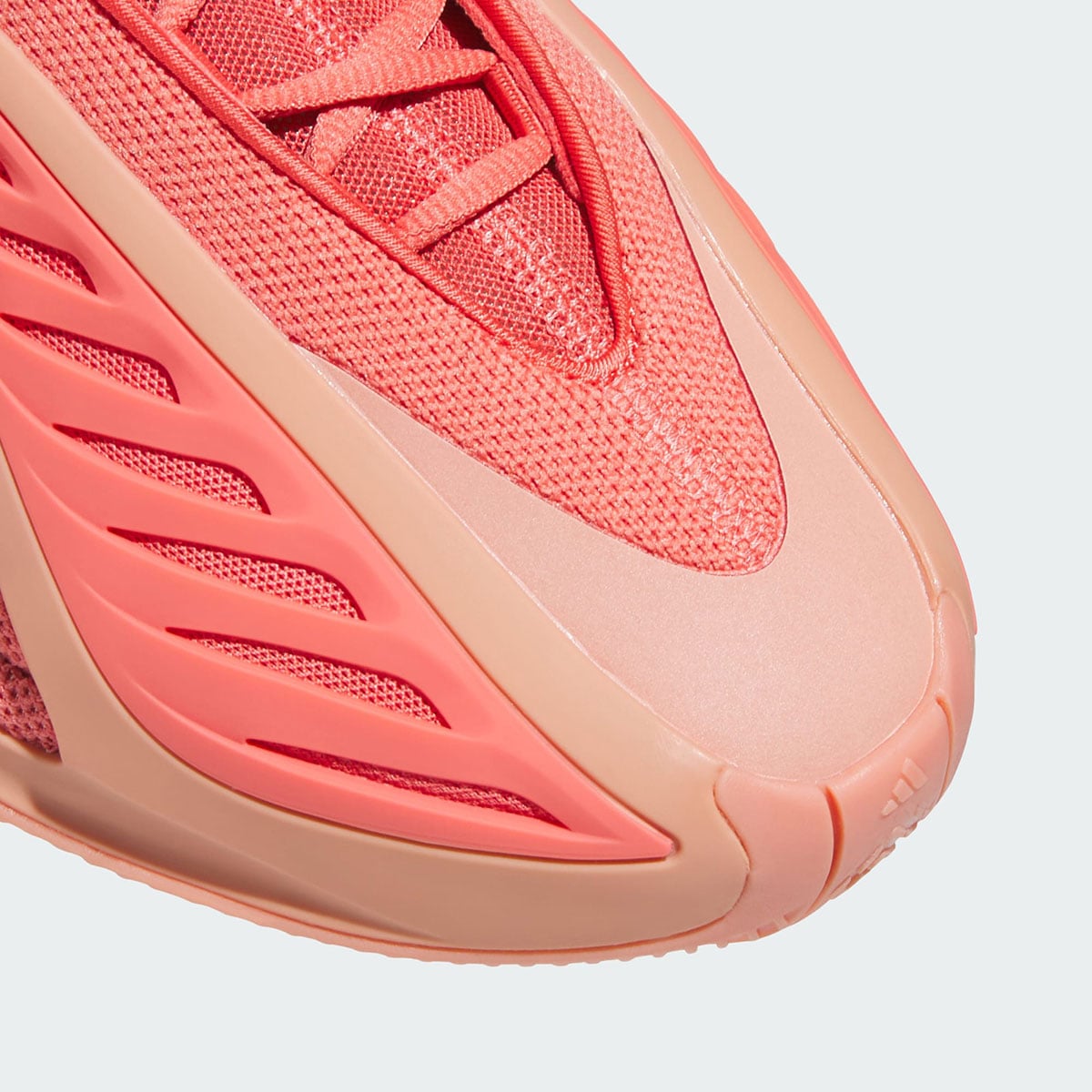 Close-up of the salmon TPU toe wing and coral knit on the adidas Anthony Edwards 2 Georgia Red Clay