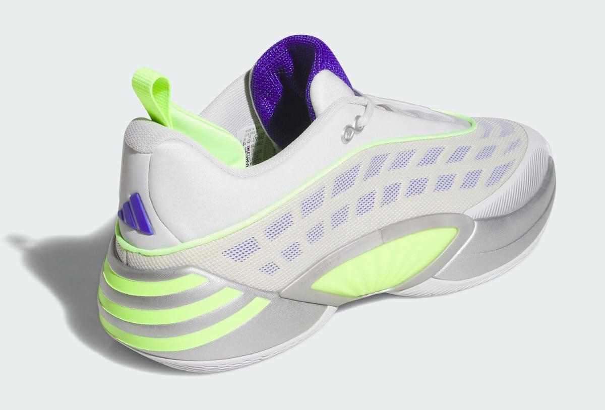 Rear view of the Silver Spida with a purple inner collar, volt heel pod, and silver and volt heel Three Stripes