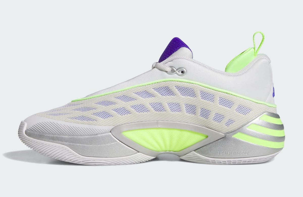 Medial side of the white DON Issue 8 Silver Spida showing the lavender web paneling and volt midfoot pod over a silver Lightstrike midsole