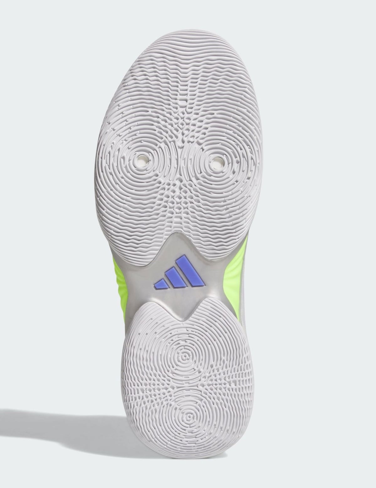 Full white rubber outsole with circular pivot traction and a blue adidas Trefoil on the silver shank