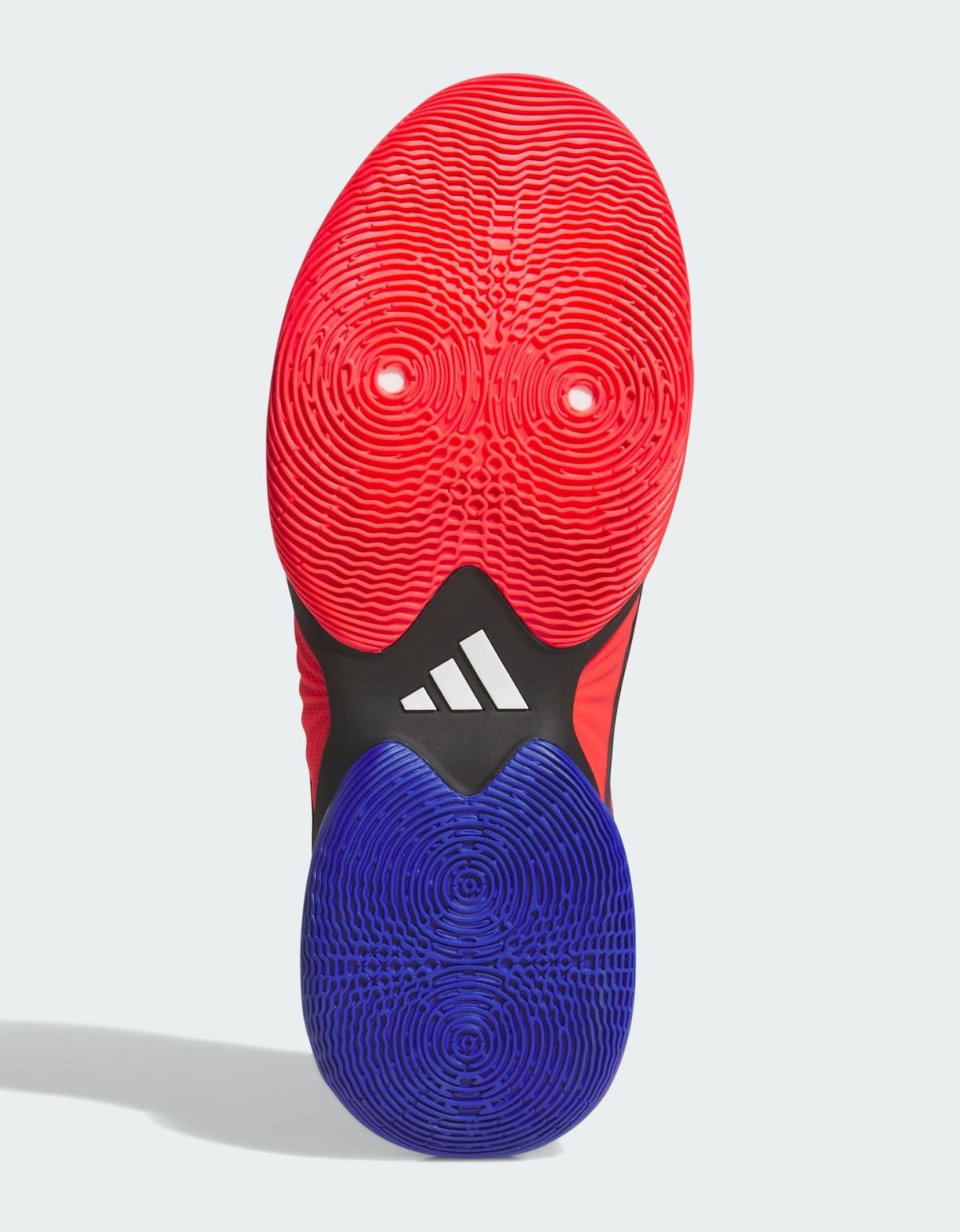 Split outsole of the Spida-Man DON Issue 8 with a red forefoot and blue heel in a circular web traction pattern