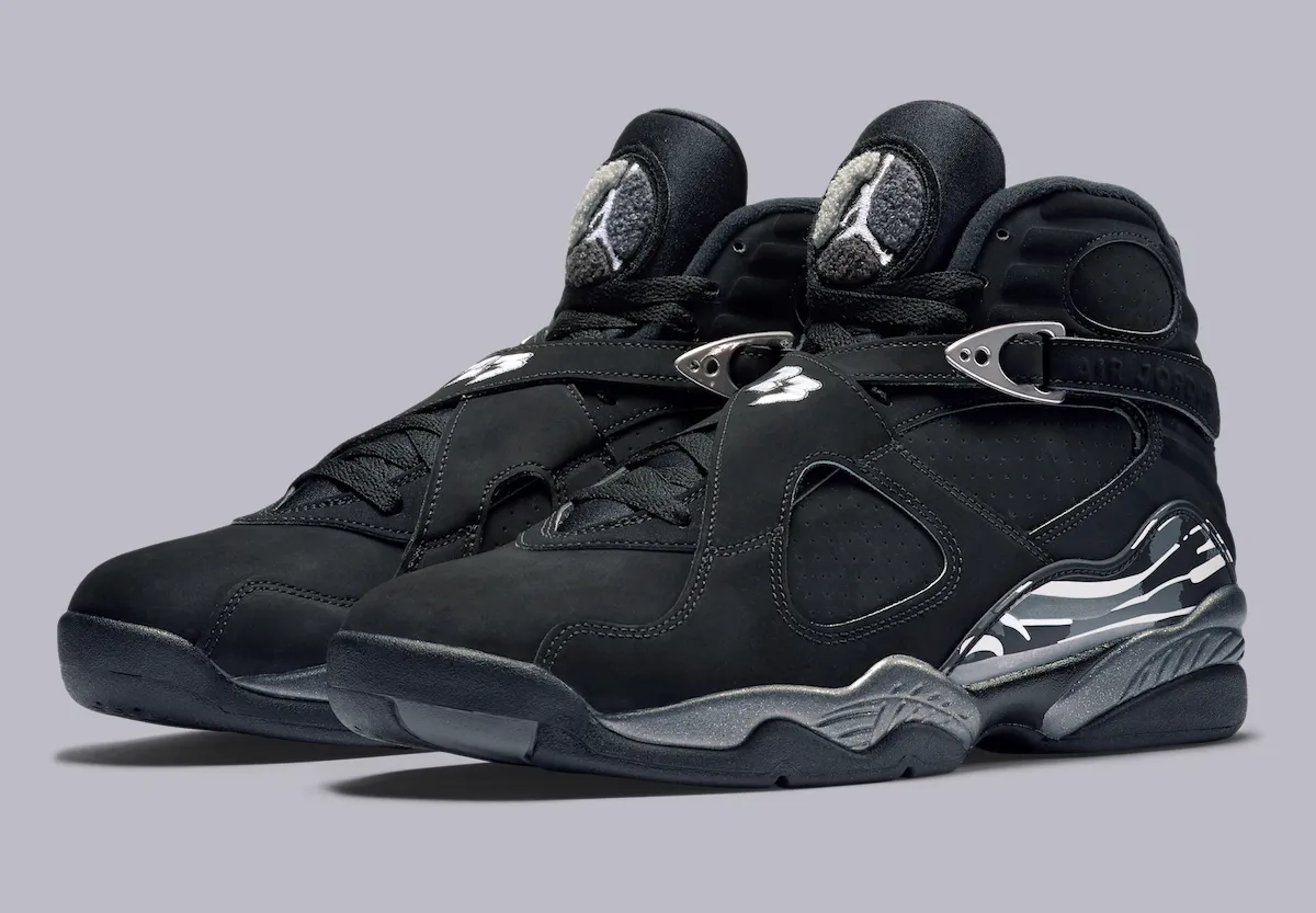 Front three-quarter view of the Air Jordan 8 Chrome 2026 pair showing the crossover straps and chrome tooling