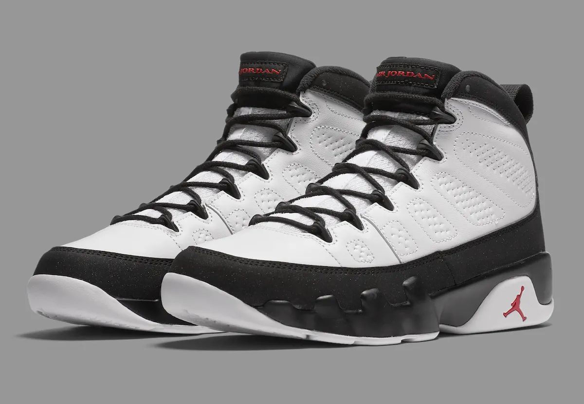 Front three-quarter pair shot of the Air Jordan 9 Space Jam 2026 showing the red AIR JORDAN tongue branding