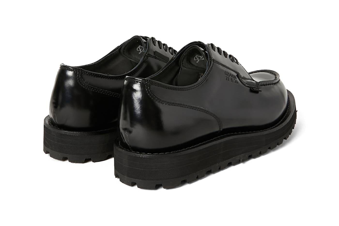 Rear three-quarter look at the pair, with rounded heel counters and an embossed production number on the side