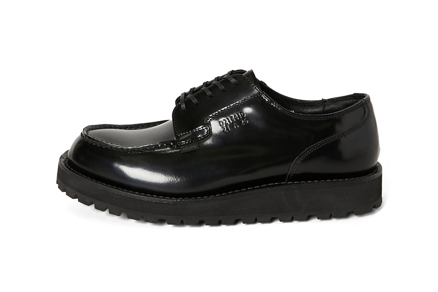 Left lateral view of the Danner Postman Shoes collaboration with embossed lettering on the polished quarter panel