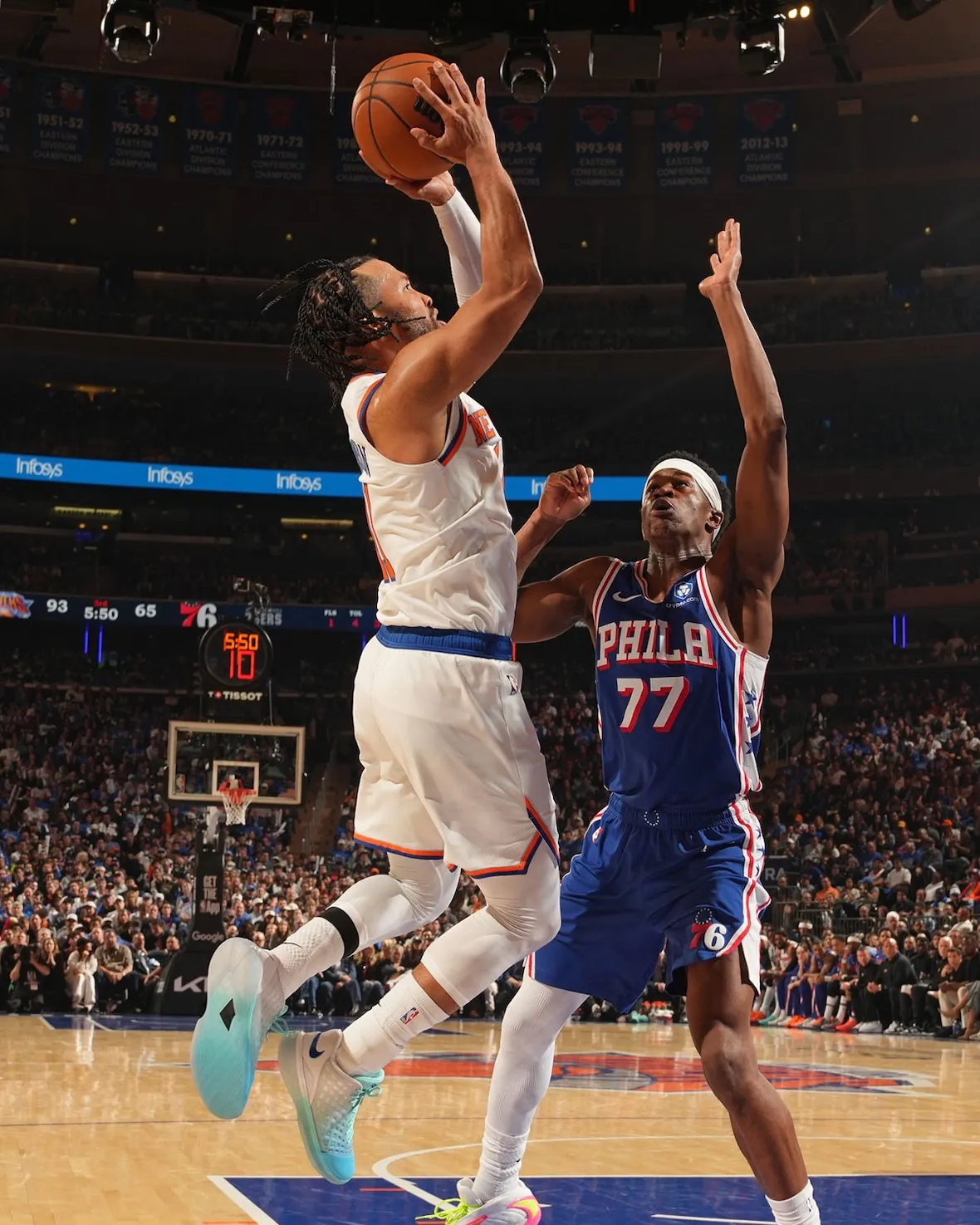 Jalen Brunson rises for a layup against Philadelphia in the Ice Blue Kobe 3 Low Protro PE at Madison Square Garden