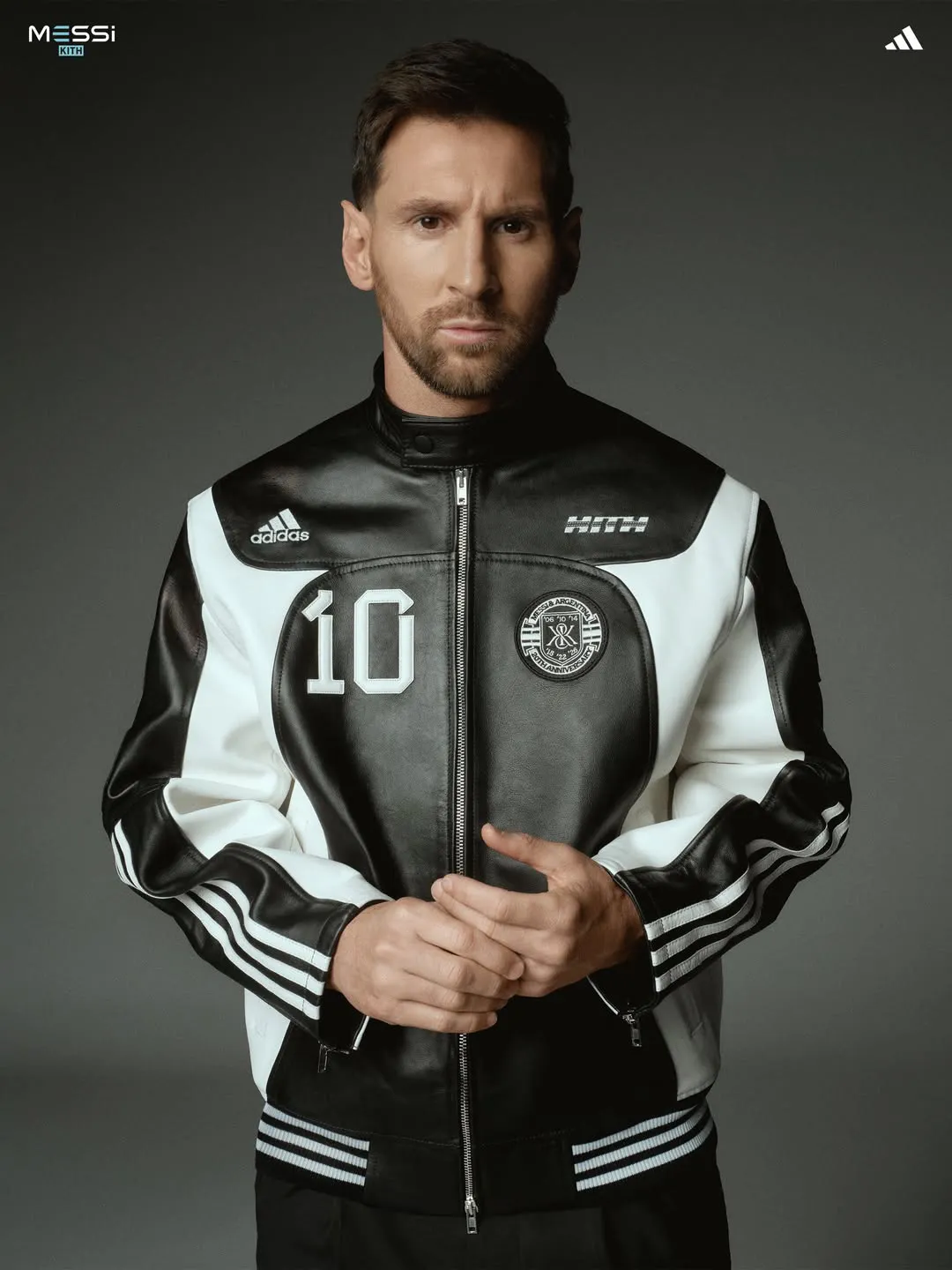 Black-and-white leather varsity jacket from the collection with a "10" chest patch and adidas three stripes