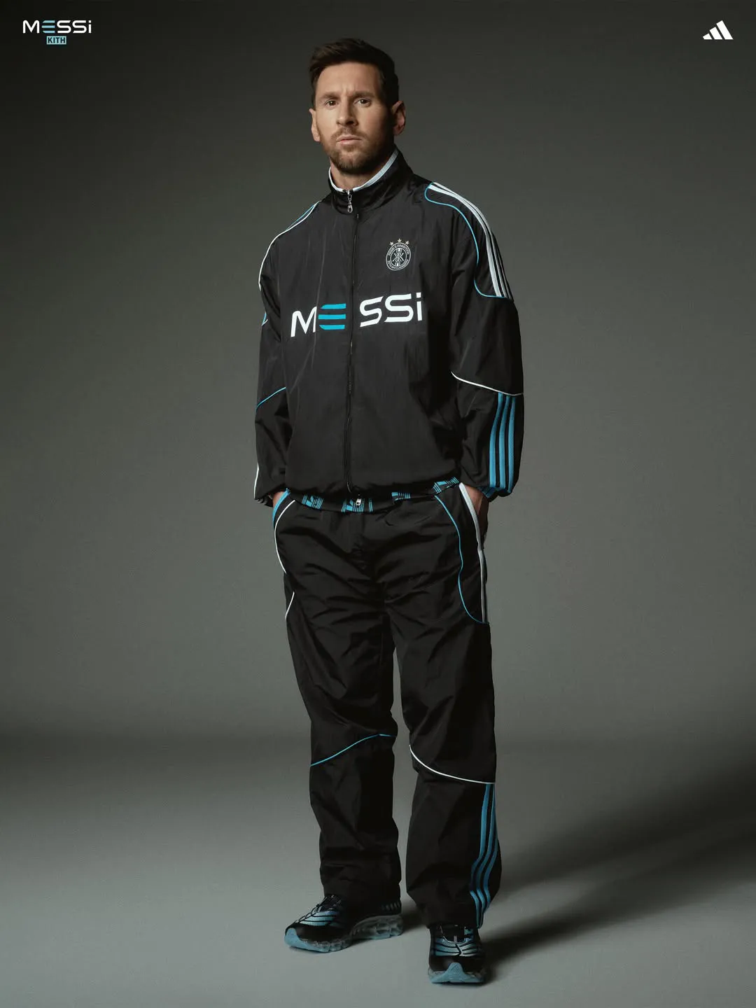 Black-and-teal Kith adidas nylon warm-up tracksuit with the MESSi logo across the chest