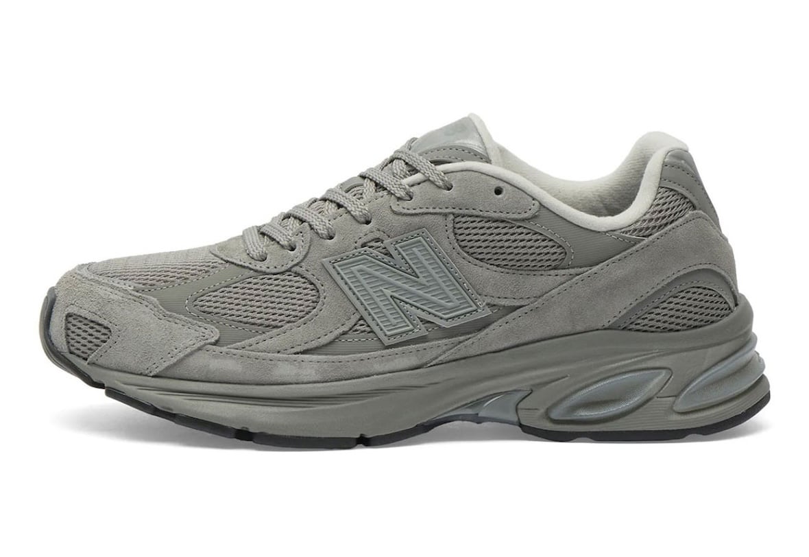 Lateral profile of the tonal grey New Balance 2010 with its large N logo and chunky sculpted ABZORB midsole