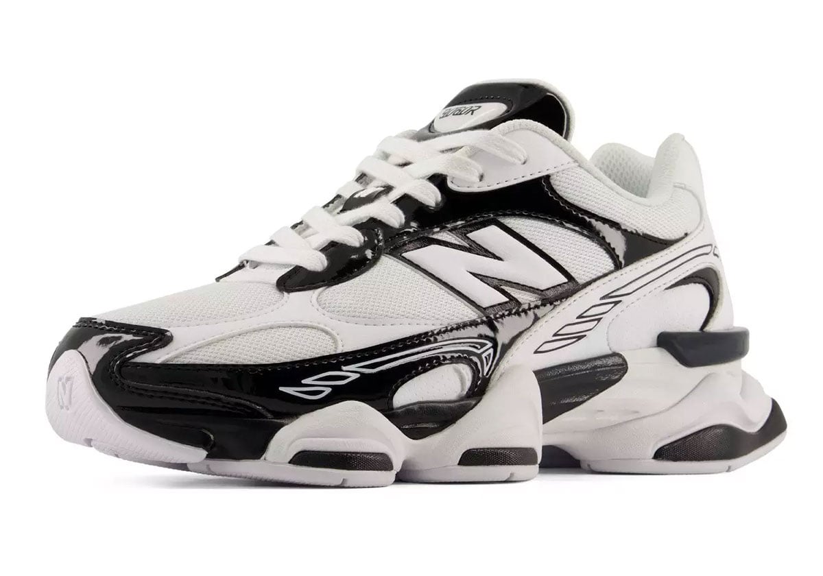 Angled front view of the white and black 9060R highlighting the chunky tooling carried over from the original 9060