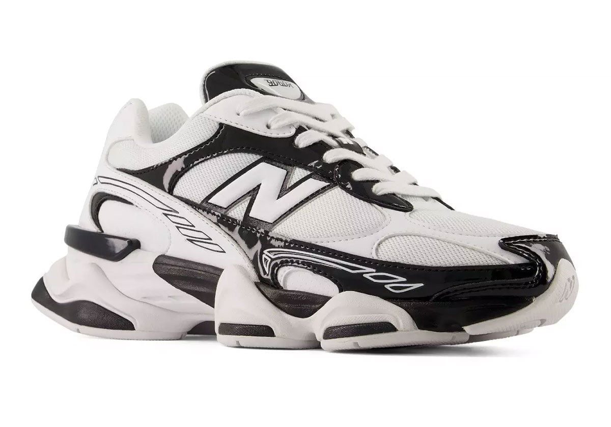 Front three-quarter view of the New Balance 9060R with black patent toe wrap and a small slanted-N on the side