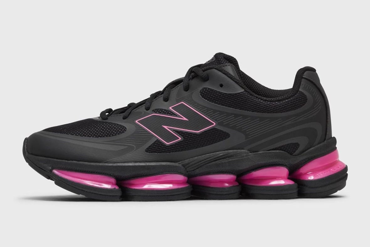 Lateral view of the triple black New Balance ABZORB 2000 with bright hot pink pods along the midsole