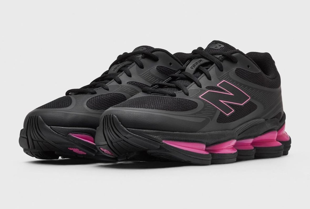 Pair of the New Balance 2000 black pink with a pink outlined N logo and hot pink translucent pods