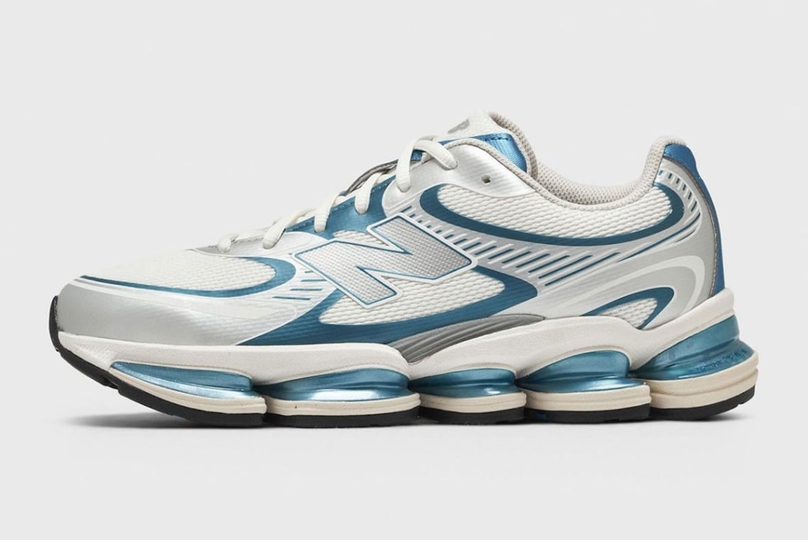 Lateral view of the white teal New Balance ABZORB 2000 colorway showing the wavy exposed pod midsole