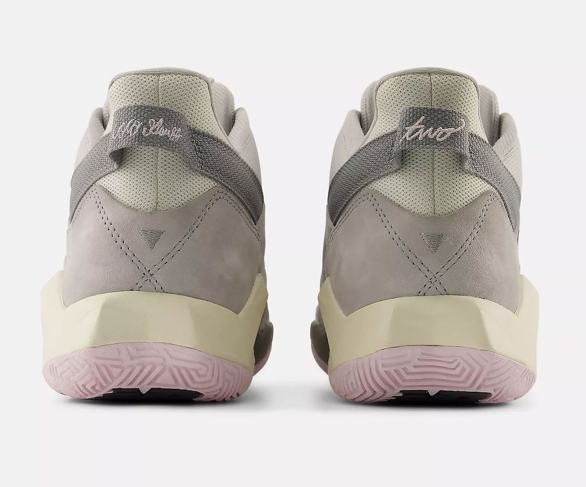Heel view of the grey suede Coco CG2 with embroidered script and a cream midsole over a pink outsole