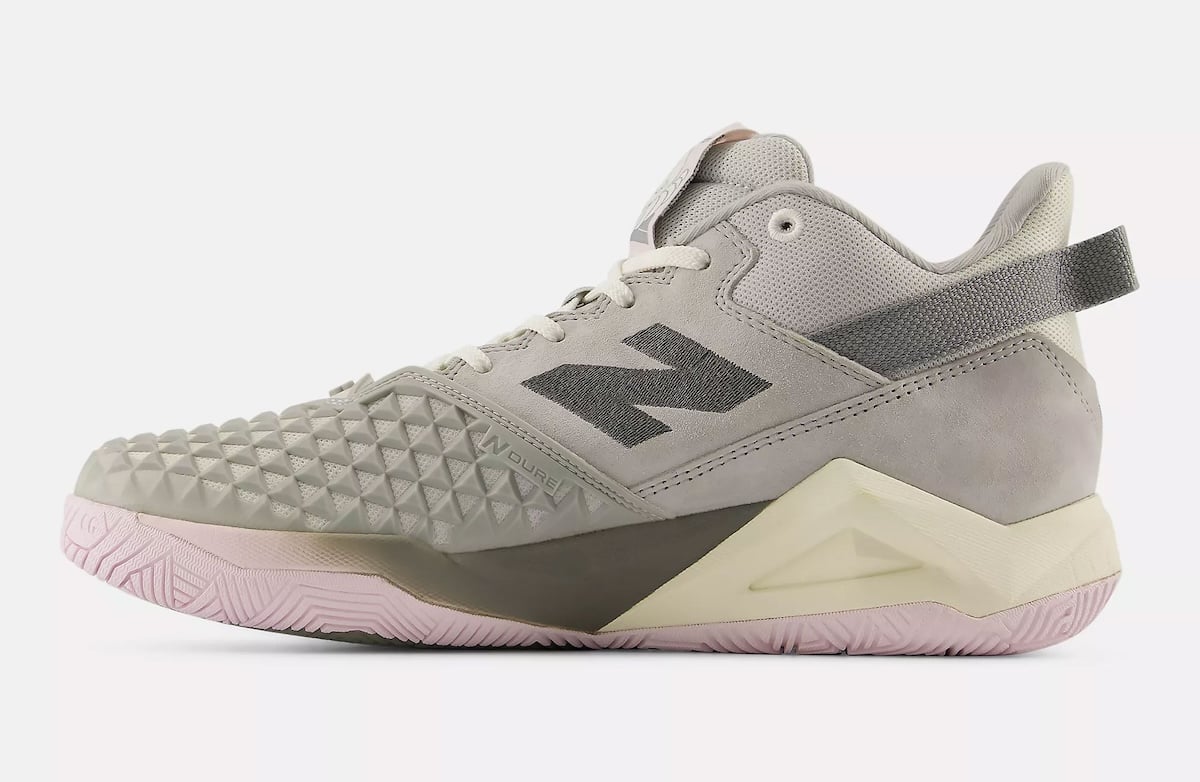 Medial profile of the Coco CG2 showing the suede upper, NDUREL toe panel and cream FuelCell midsole