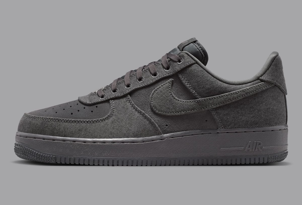 Lateral profile of the Anthracite denim Air Force 1 Low with a tonal Swoosh and debossed AIR heel
