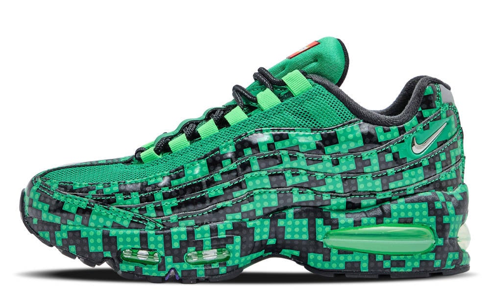 Lateral view of the Nike Air Max 95 LEGO "Lucky Green" GS, a green mesh upper with black-and-green pixel brick panels and a silver Swoosh