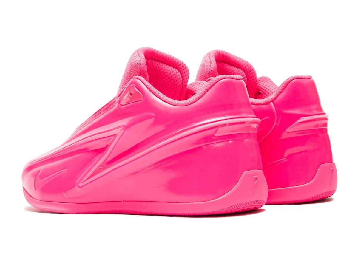 Heel view of the pink KD 19 pair, showing the sculpted molded heel and tonal lightning-bolt midsole
