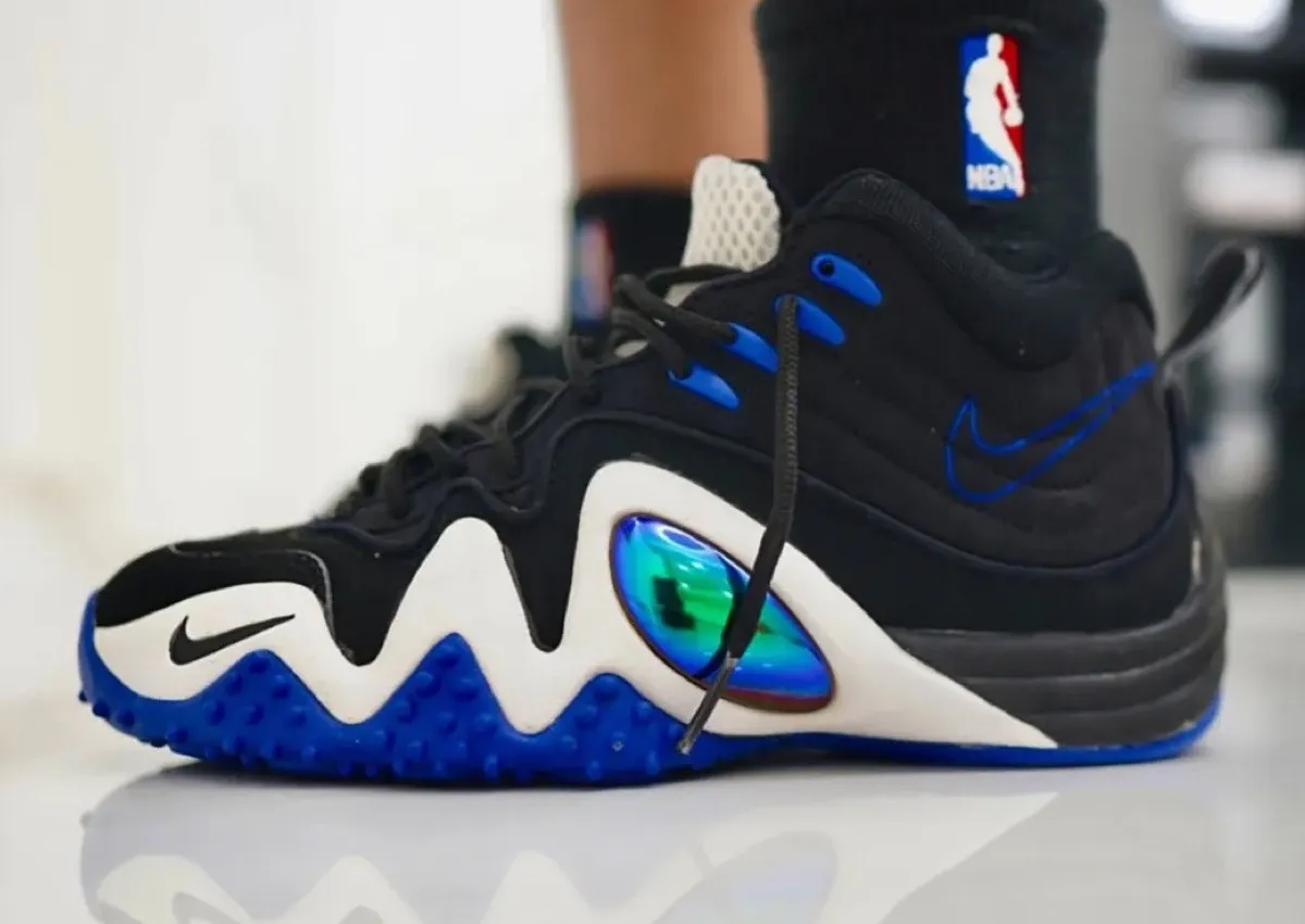 Lateral view of the Nike Zoom Flight 5 Jason Kidd retro, black nubuck upper with white wave midsole and royal blue outsole