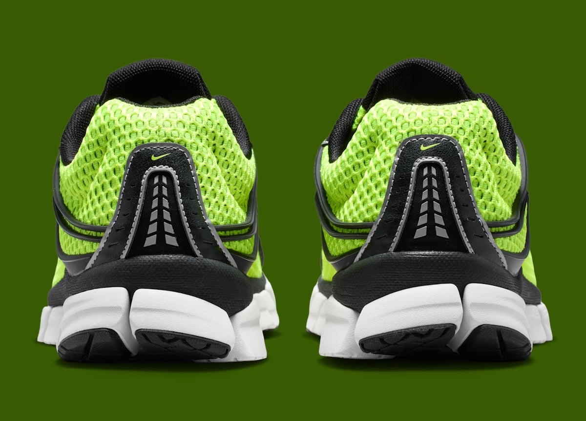 Heel view of the volt mesh upper with grey Zoom Air heel ribbing and a segmented white and black midsole
