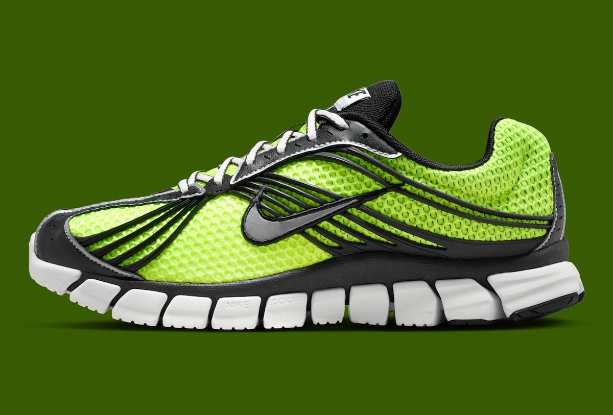 Lateral profile of the Nike Zoom Skylon 11 Volt with NIKE ZOOM midsole branding and a black caged overlay