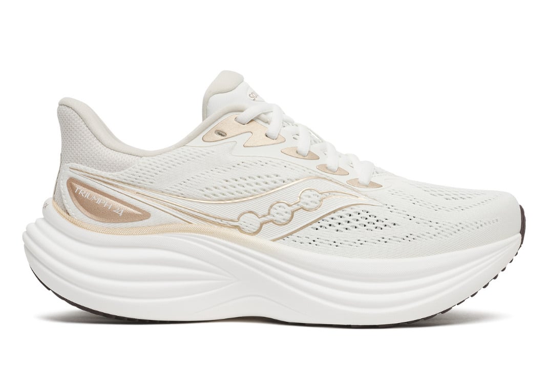 Lateral profile of the Ivory/Eggshell Triumph 24 with gold Saucony branding and a white IncrediLUX midsole