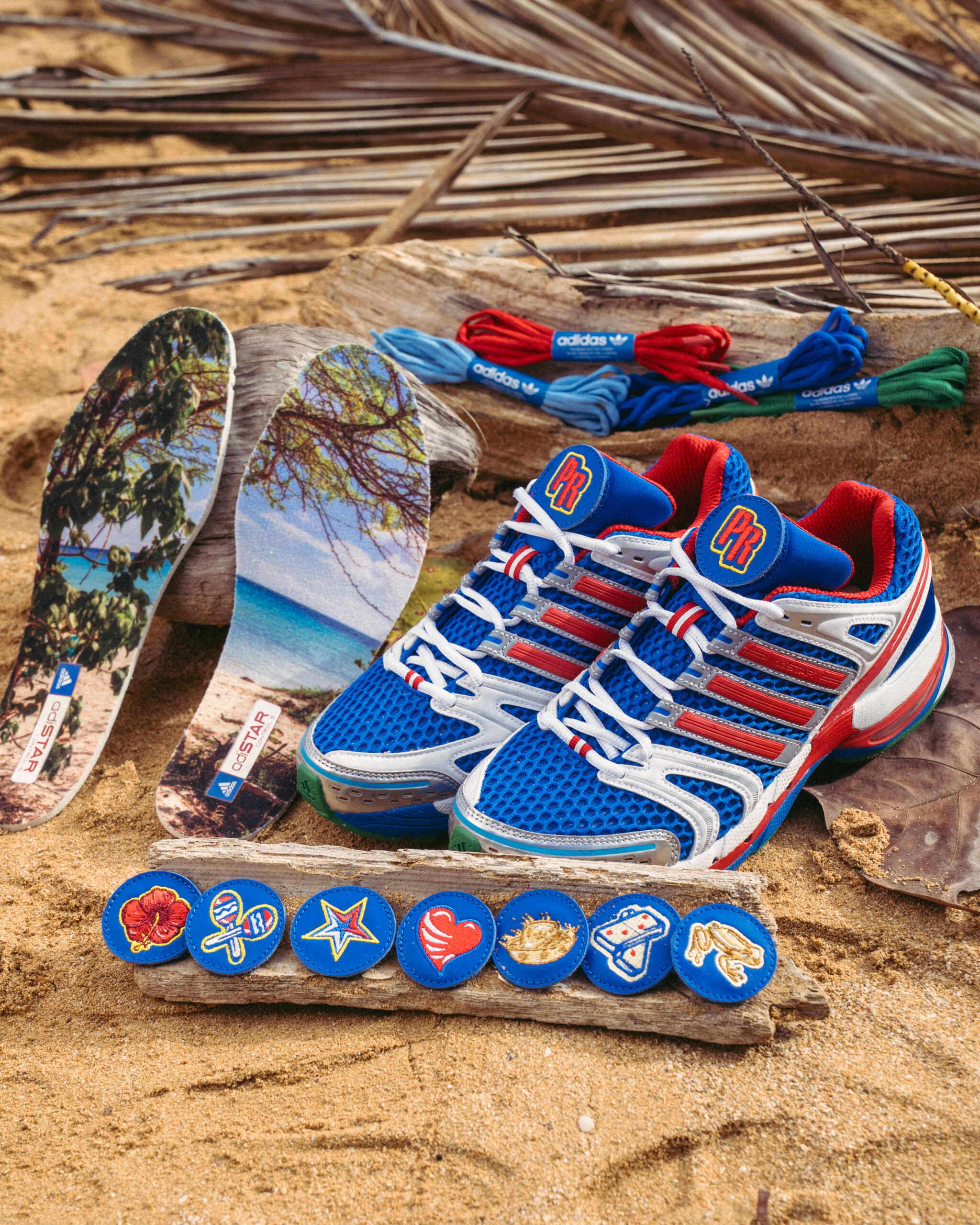 Sneaker Room x adidas Adistar Control 5 "PR" with the nine interchangeable tongue patches inspired by Puerto Rican cultural symbols
