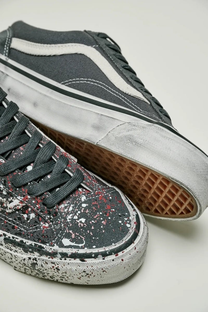 Macro of the grease-aged off-white foxing and gum waffle sole on the Charcoal Grey Old Skool 36