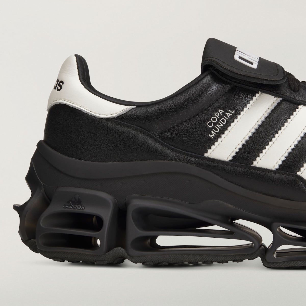 Close-up of the heel and the hollowed black Megaride midsole pods beneath the COPA MUNDIAL leather panel