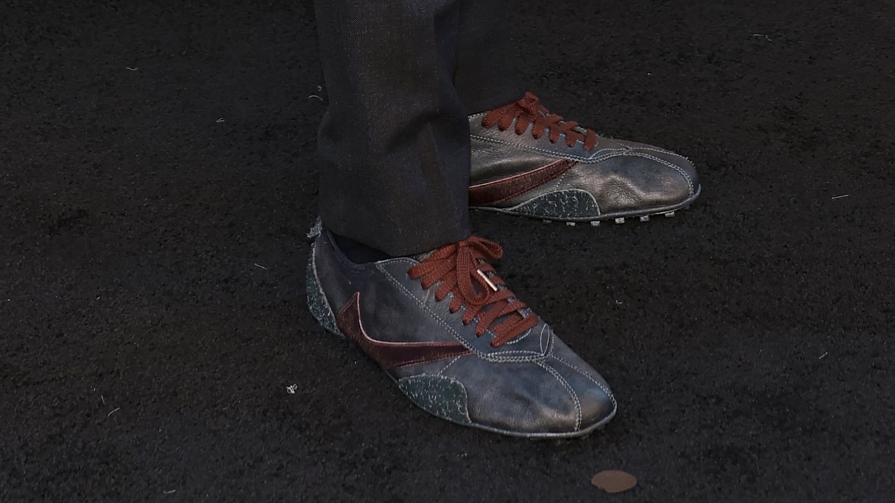 Travis Scott Unveils a Custom Nike Moon Shoe at The Odyssey Premiere