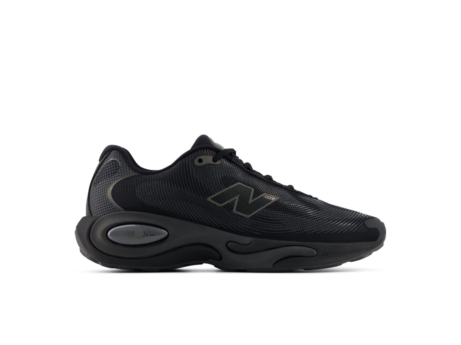Side view of the men's all-black AC Runner, smoked-out Fresh Foam pill and tonal N logo on dot-print mesh