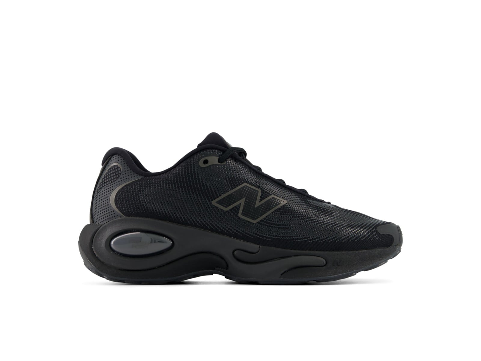 Side view of the women's AC Runner in triple black, tonal dot-print mesh over a blacked-out Fresh Foam X midsole