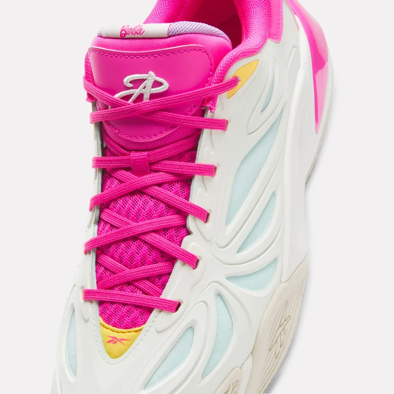 Close-up of the tongue with the Barbie script and Angel Reese 'AR' logo above magenta mesh