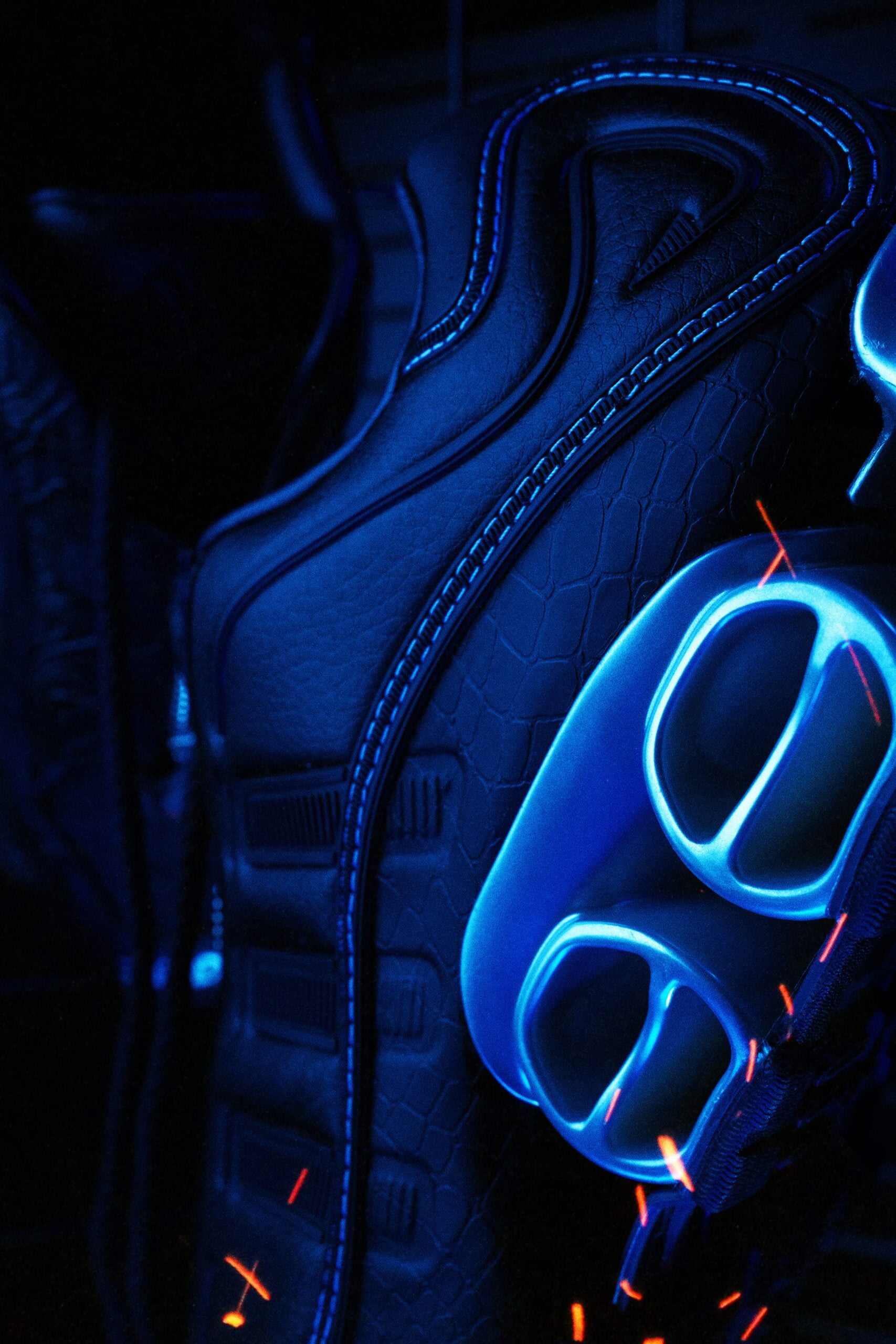 close-up of quilted medial panel beside translucent blue heel pod with oval cutouts, DIOS Megaride 01